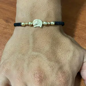 Pulsera con dije de caballo