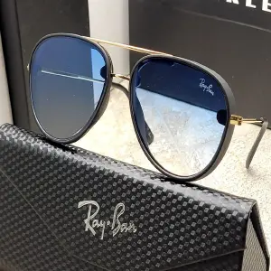 LENTES SOL RAYBAN AZUL O ROJO + ESTUCHE