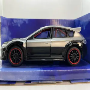 BRIAN´S SUBARU IMPREZA WRX STI PLATEADO
