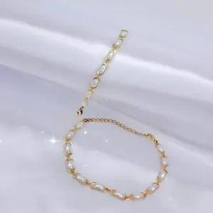 MANILLA DORADA PERLAS BLANCAS