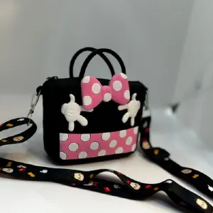 BOLSO-MORRAL MINNIE EN SILICONA GRANDE