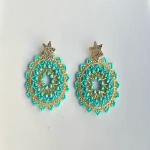 ARETAS TEJIDA EN VERDE AGUA DE ESTRELLA