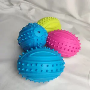 PELOTA DE RUGBY LIMPIA DIENTES MASCOTAS