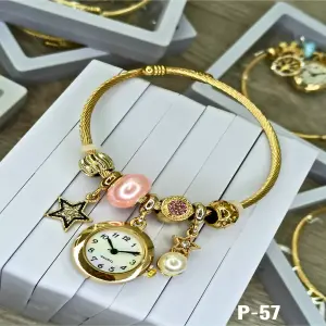 P-57 RELOJ PULSERA DORAD DIJE ESTRELLA