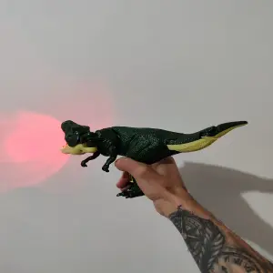 DINOSAURIO REX 30CM ORI- SON ZA ZA ZA