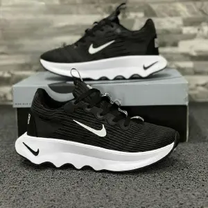 NIKE RAYAS CABALLERO