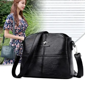 BOLSA TRANSVERSAL COURO