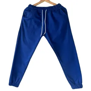 JOGGER NIÑOS AZUL REY 16