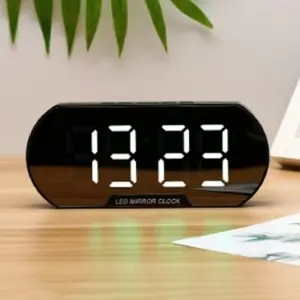 Reloj moderno tipo espejo redondo