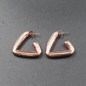 ARETE TRIANGULO GRUESITO ROSA