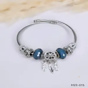 PANDORA PLATA ESTELAR AZUL: Elegancia Celestial en tu Muñeca - PANDORA PLATEADA AR0S AZULES