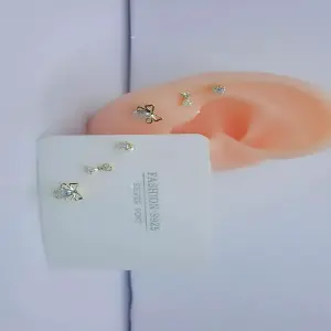 TRIO TOPOS DE MOÑO Y CRISTAL DORADO: Elegancia Deslumbrante para tu Estilo - TRIO TOPOS DE MOÑO Y CRISTAL DORADO
