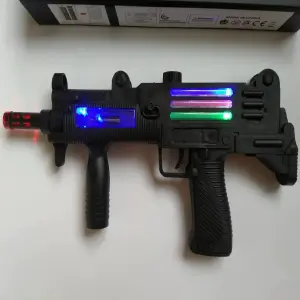 ¡Descubre la PISTOLA MINI UZI con Luz LED y Sonido! - PISTOLA MINI UZI LUZ LED Y SONIDO