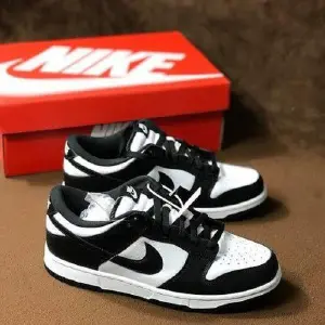 Nike Dunk Low Negro Blancos: Estilo Icónico Reimaginado - nike dunk low negro blancos