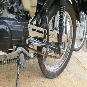 GUARDA CADENA RX115: Protección y Estilo para tu Moto - GUARDA CADENA RX115